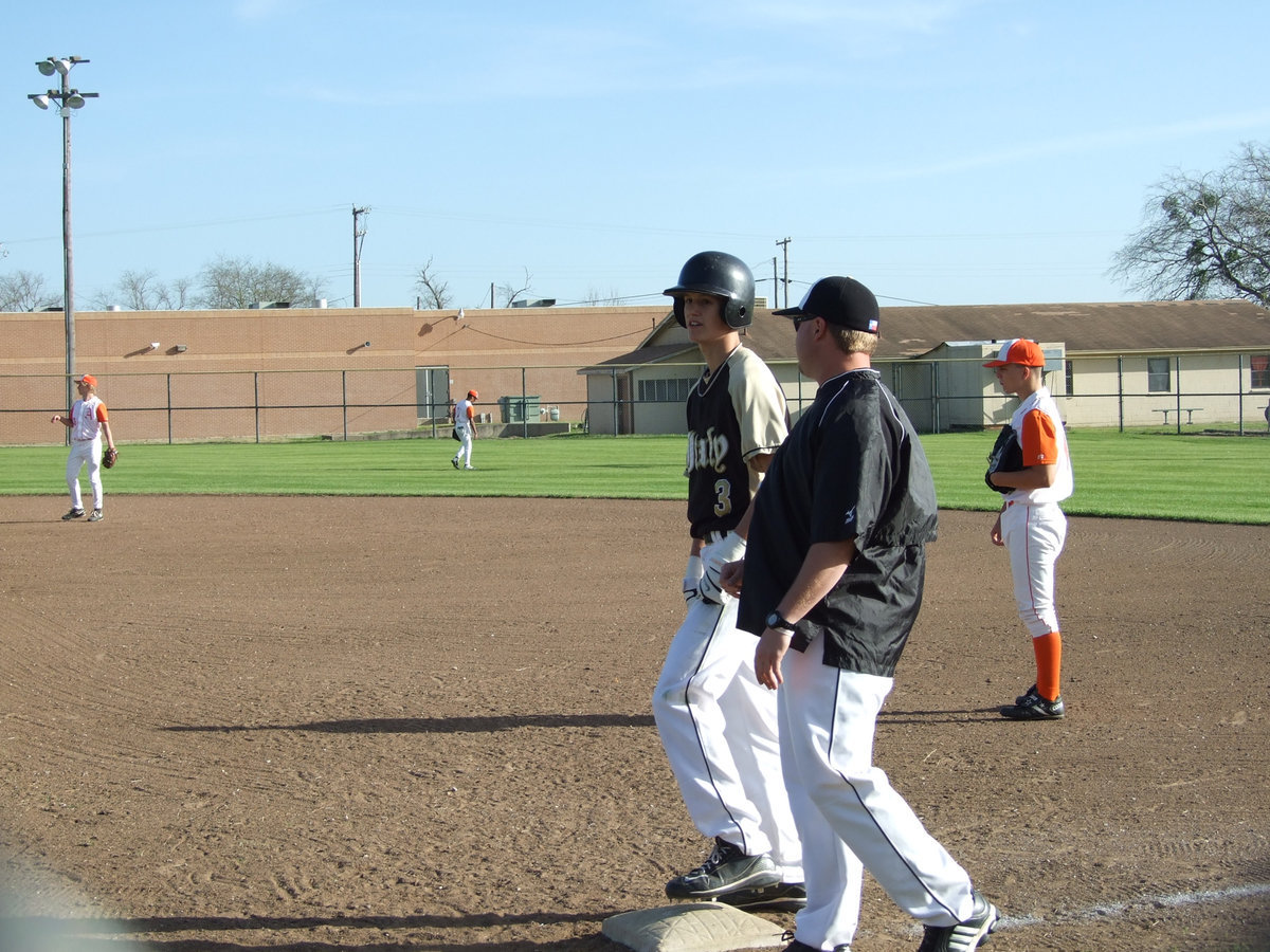 Image: Jase holds here — Sophomore Jase Holden (1st team all district-outfield) keeps ready to run.