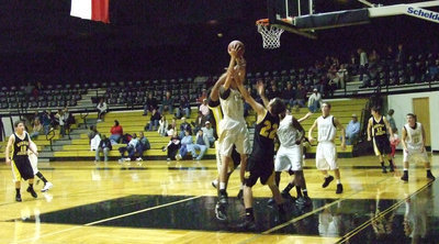 Image: Colton Campbell Shoots — Campbell #5 was leading scorer with 18 points Friday night.
