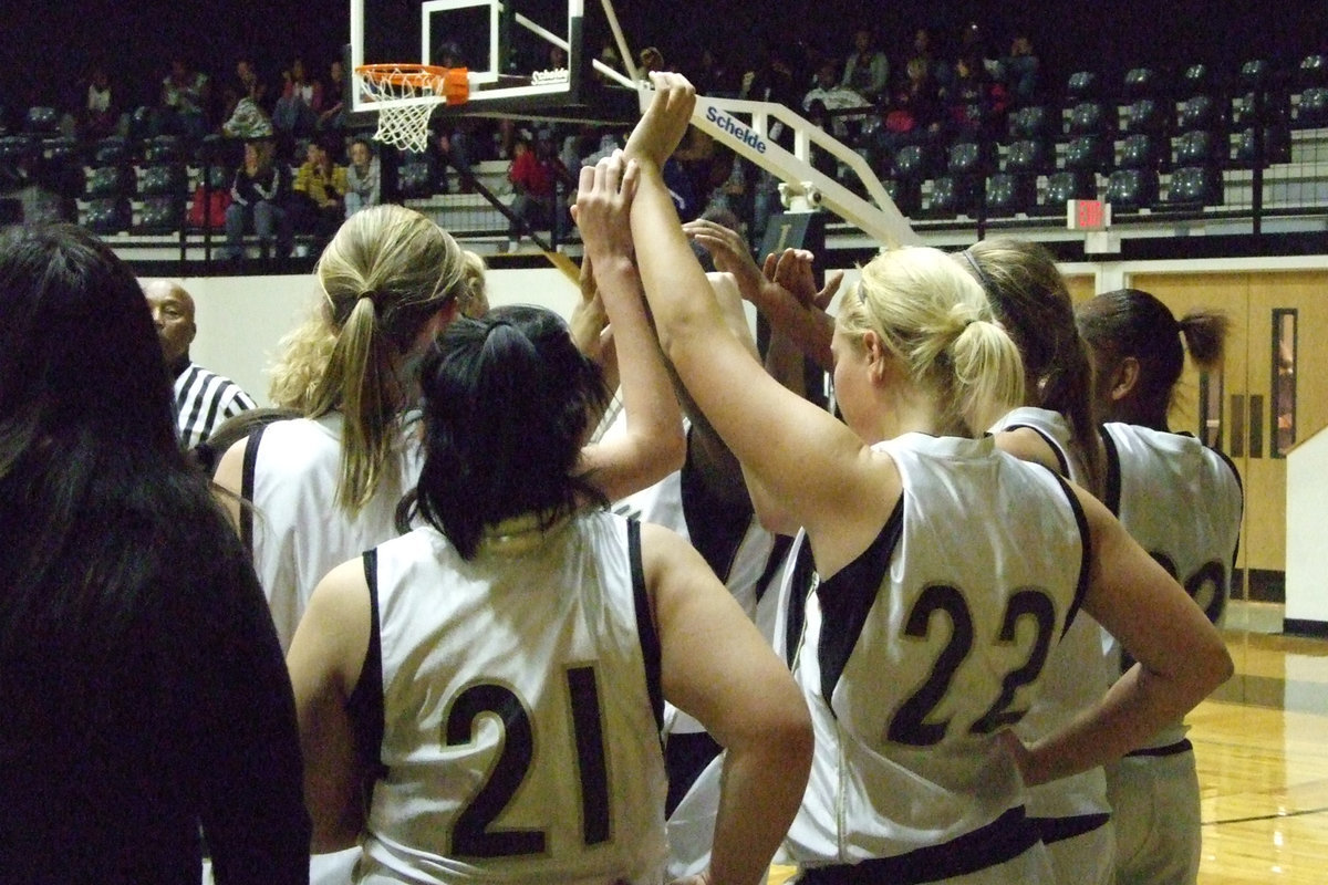 Image: Huddle — Coach McDonald took a time out and explained the next play.