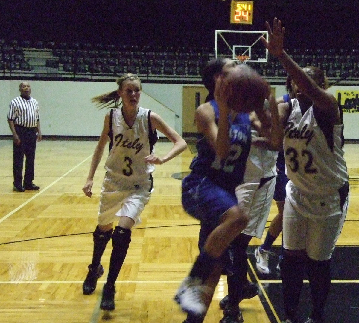 Image: Shay Fleming — Shay Fleming #32 blocks the lay up.