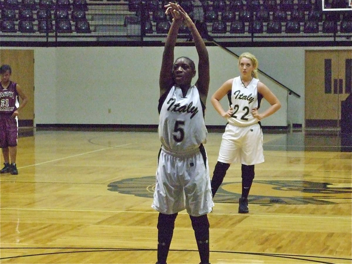 Image: Jameka is all business — Lady Gladiator Jameka Copeland(5) concentrates at the free throw line while Megan Richards(22) watches it drop in.