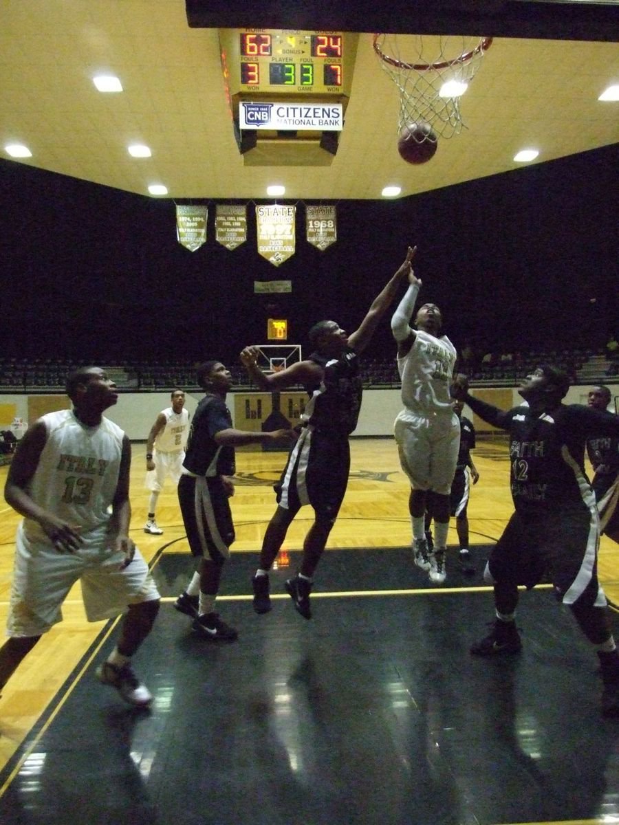 Image: It’s what he does — Italy Gladiator Jasenio Anderson(11) drives in for a layup.