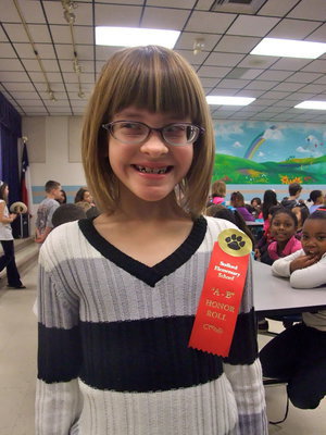 Image: Kinsey Watley — Kinsey is in the first grade and received all A’s and B’s this six weeks.