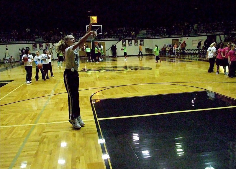 Image: Perry shoots — 5th grader Annie Perry shows good form during the IYAA halftime shootaround.