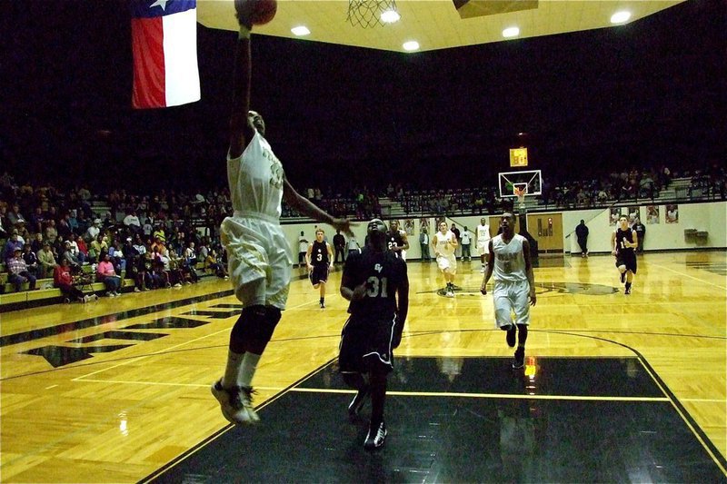 Image: Beast break — Jasenio Anderson(11) beats Grandview to the basket but the Zebras beat the Gladiators, handing Italy its first district loss in two seasons.