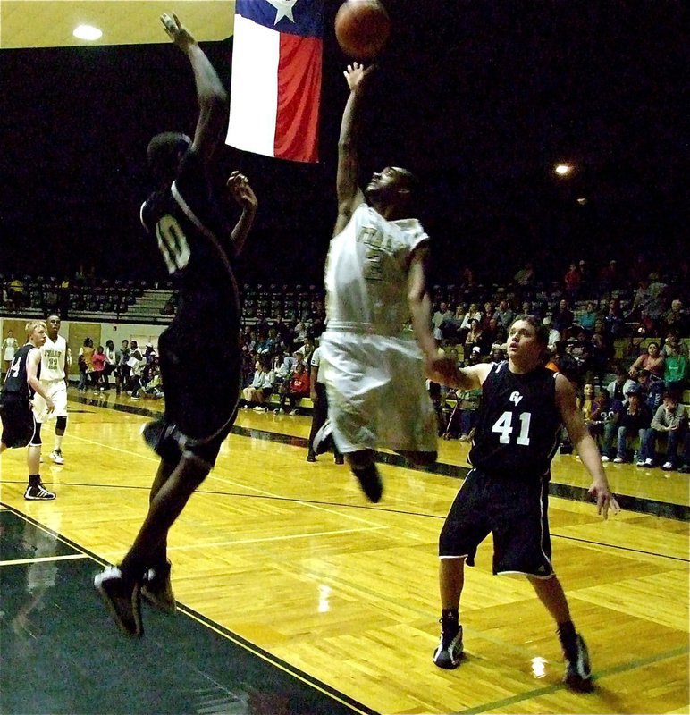 Image: Heath Clemons — Gladiator Heath Clemons(2) draws a shooting foul while flying in from the baseline.