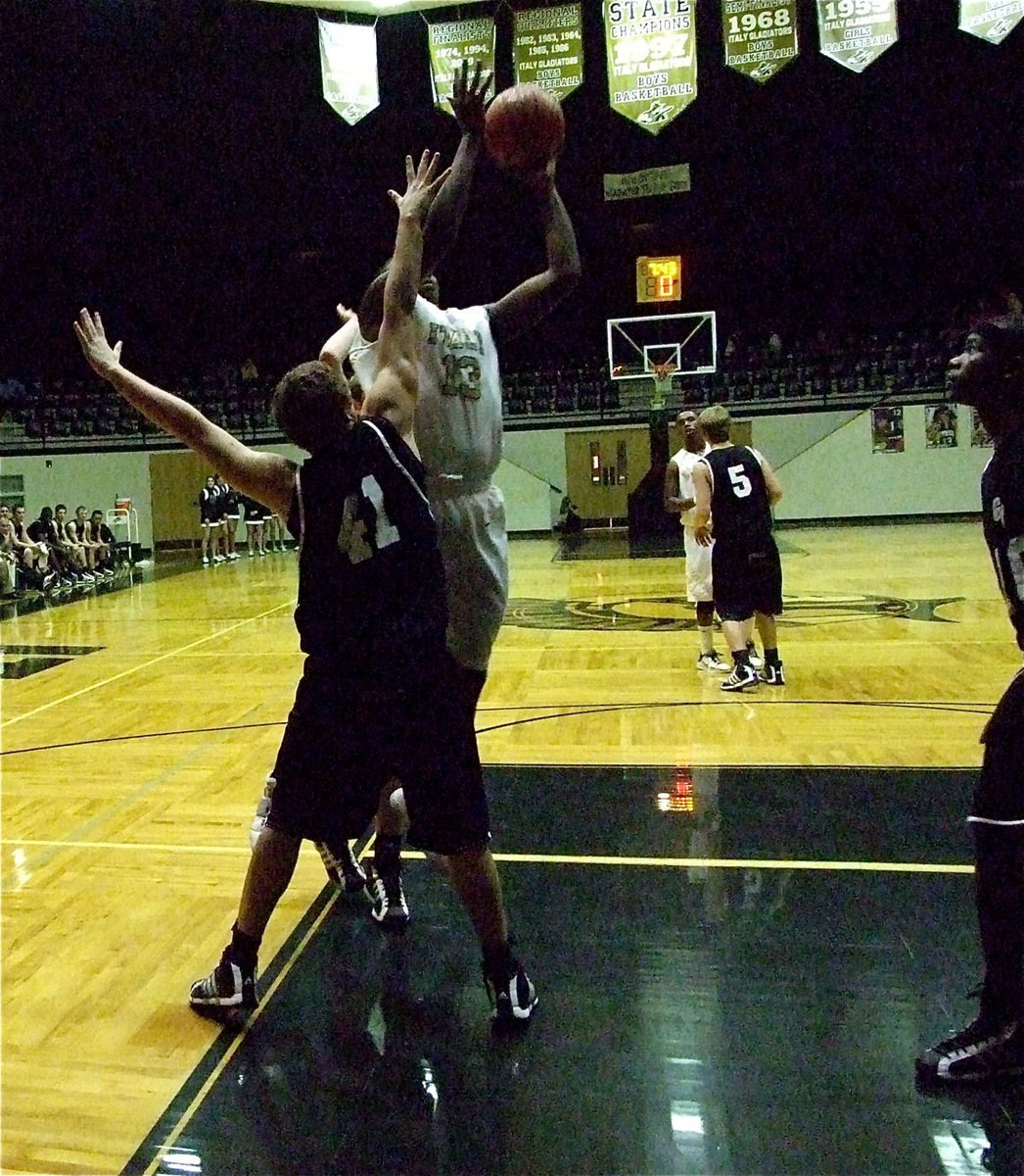 Image: Mayberry’s the man — Italy’s Larry Mayberry(13) works his magic in the paint against Grandview.