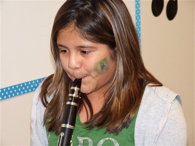 Image: Kimberely concentrates — Kimberely appears to be a natural on the clarinet.