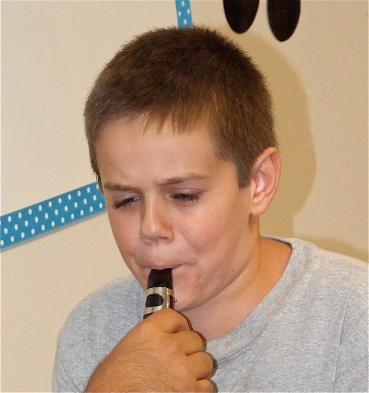 Image: The draft — Jacob enters the draft and gives the clarinet a try.