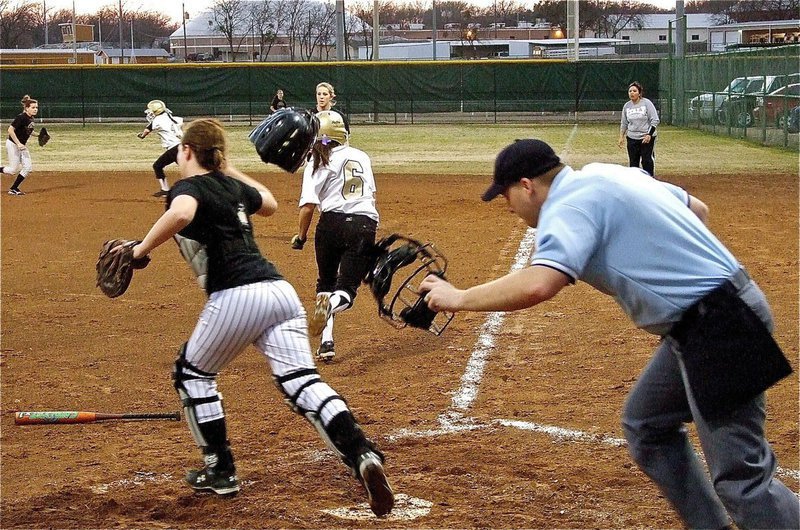 Image: Lady Gladiator Anna Viers(6) beats Palmers’ throw to first base — There goes Anna! Already leading 2-0 In the top of the second-inning, Italy’s lead-off hitter, Anna Viers(6), beats the throw to first base and loads the bases against Palmer.