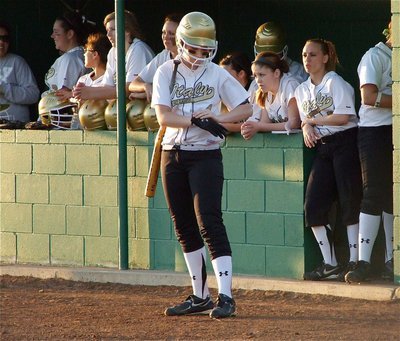 Image: This glove fits — Bailey Bumpus(4) tightens the glove, that holds the bat, that breaks pitcher’s hearts.