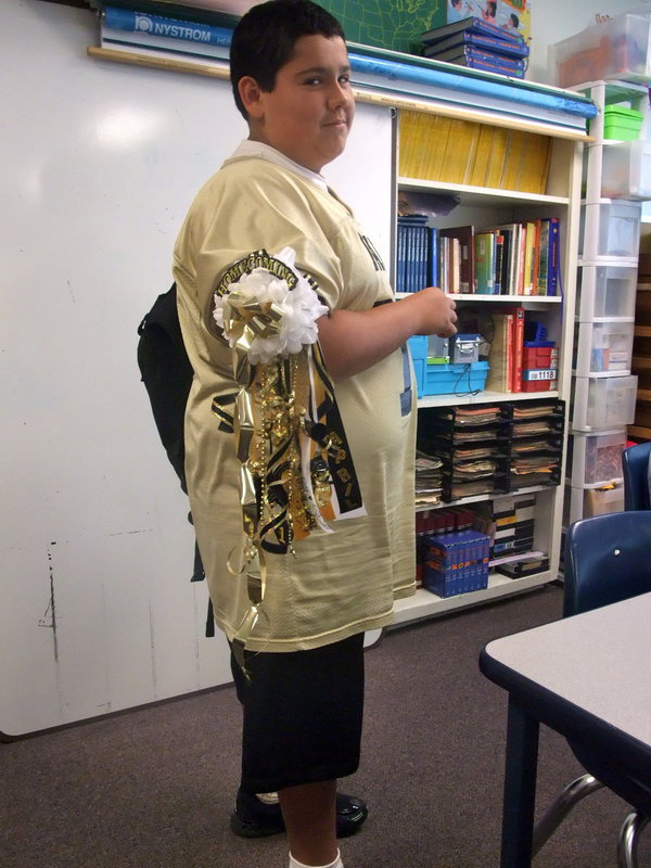 Image: Check This Out! — Adrian shows his “Gold” spirit!