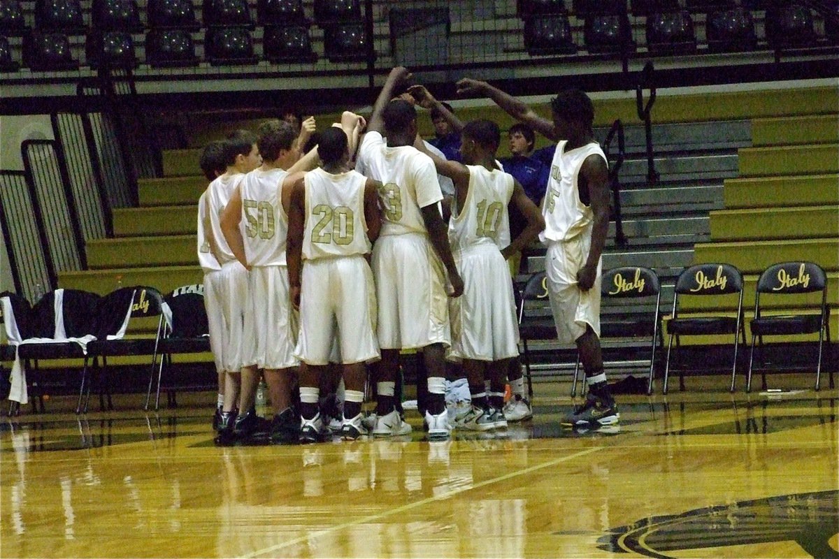 Image: Weapons….check! — Italy’s JV squadron gets ready to storm the court against the Blooming Grove Lions during the tournament championship.