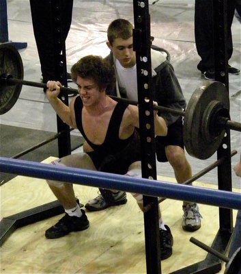 Image: Brandon Souder — Junior Gladiator Brandon Souder powers his way up in the squat cage.