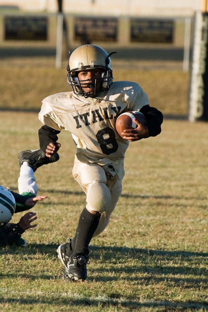 Image: Pulling Away — 8 – Kendrick Norwood displays his athletic ability by running faster than a Wildcat.