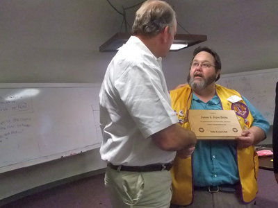 Image: Award of Appreciation — Arvil Gowin presented Jimmy Hobbs with an award of appreciation for all the help he and his wife Joyce have given the Italy Lions Club.