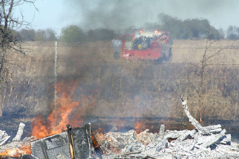 Image: Spraying Water — Italy Fire Department did not leave until the fire was under control.