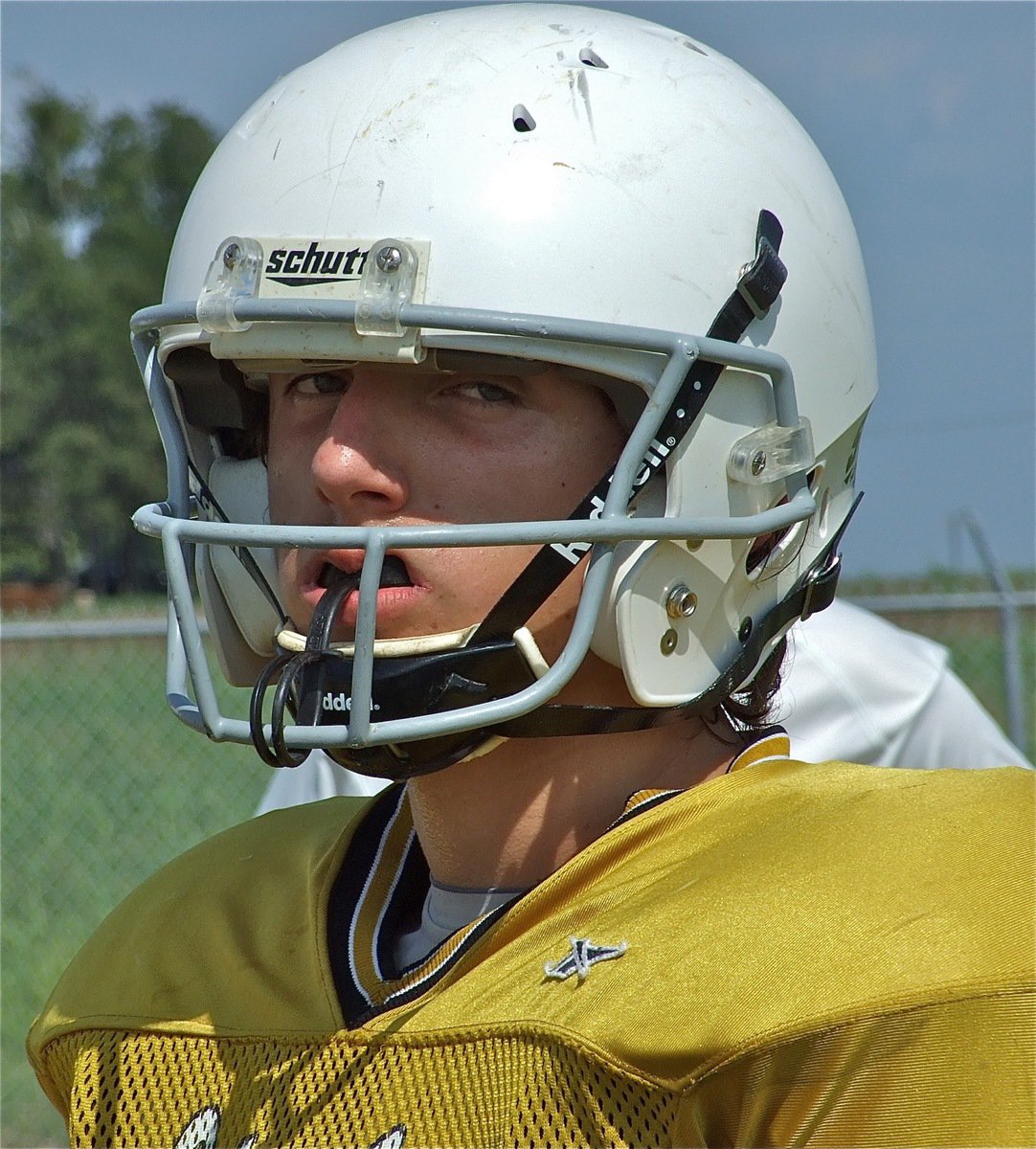 Image: Speed and toughness — Chace McGinnis is a deep pass threat for the 8th grade squad.