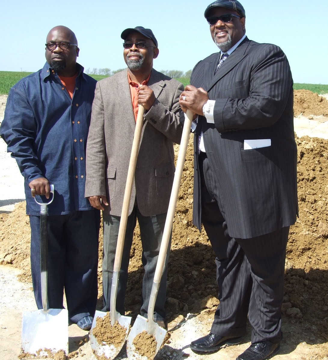 Image: Pastors Dixon, Isaac and Davis do the honors — Pastors Preston Dixon, Algua Isaac and Denny Davis gather together to dedicate the new church.