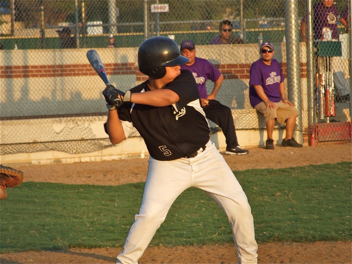 Image: Reid swings — Reid Jacinto takes a swing at the Waco Mud Dogs’ defenses.