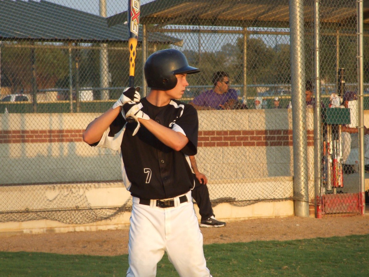 Image: Trevor settles in — Trevor Patterson takes his turn at Riverbend Park.