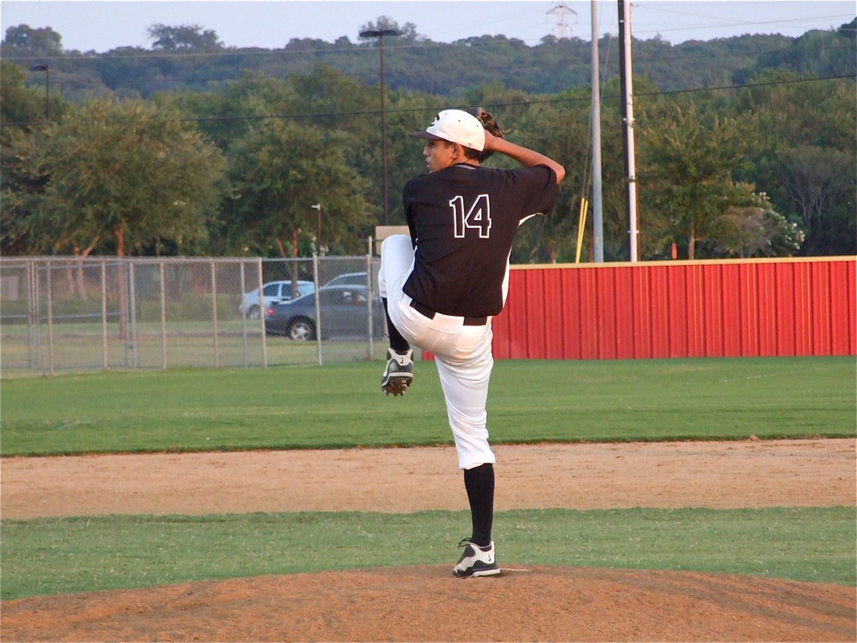 Image: Wait a Minniear! — Pitcher Karsen Minniear of Corsicana delivers a strike for Italy’s select team.