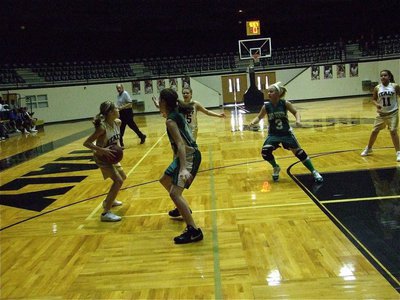 Image: Passing it along — Halee Turner(3) tries to pass the ball to an open teammate.