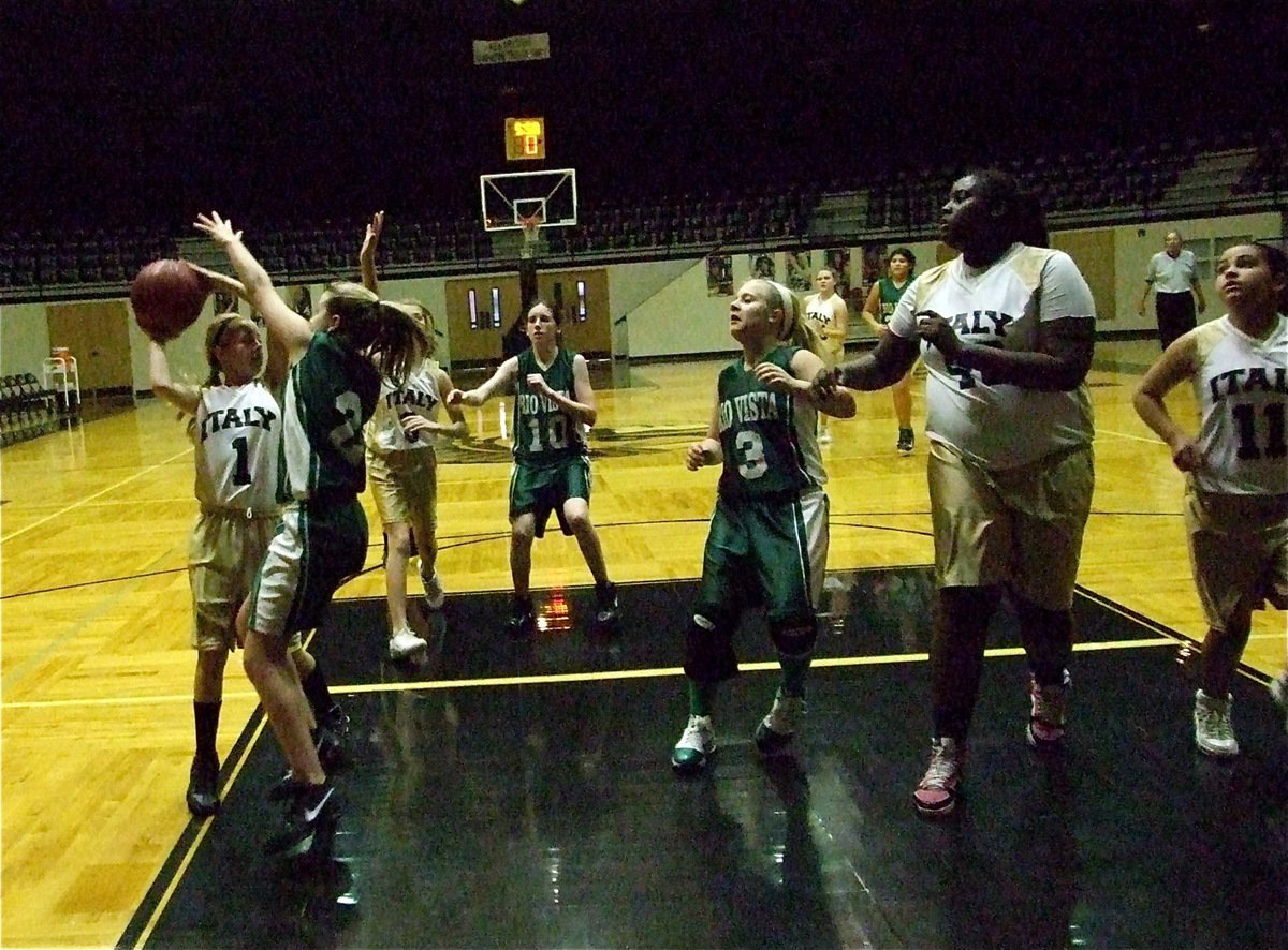 Image: Looking to pass — Brittany Chambers(1) looks to pass inside to Shercorya “Cory” Chance(40) during an Italy fast break.