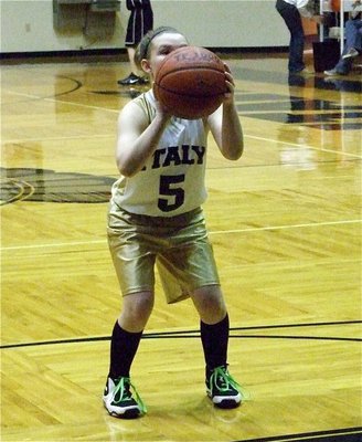 Image: Tara is talented — Tara Wallis(5) prepares to shoot a free-throw during the 8th Grade game.