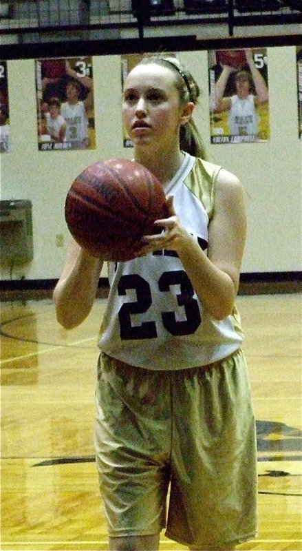 Image: Deep thought — Kelsey Nelson(23) eyes the target from the foul line and hits 1-of-2 free-throws.