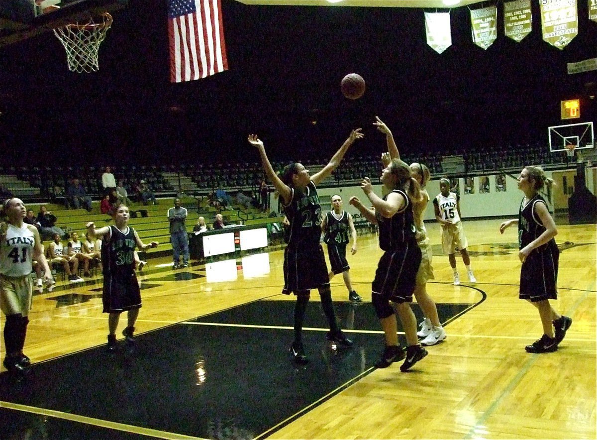 Image: Madison shoots — Madison Washington(33) shoots over the Eagles defense.