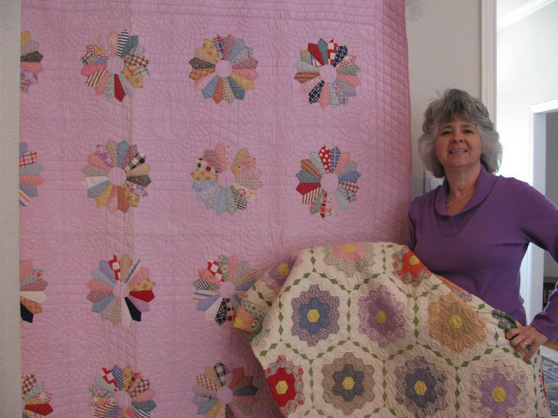 Image: Suzzy and a cherished gift — “I love old hand quilted quilts. The quilt I am holding, a Grandmother’s Flower Garden quilt, was given to me by my uncle after my Aunt Barbara died after a long illness from a Lynch Syndrome related cancer arrising in the urinary track.”