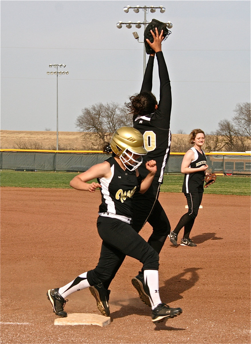 Image: Morgan reaches first — Morgan Cockerham beats Meridian’s throw to first base.