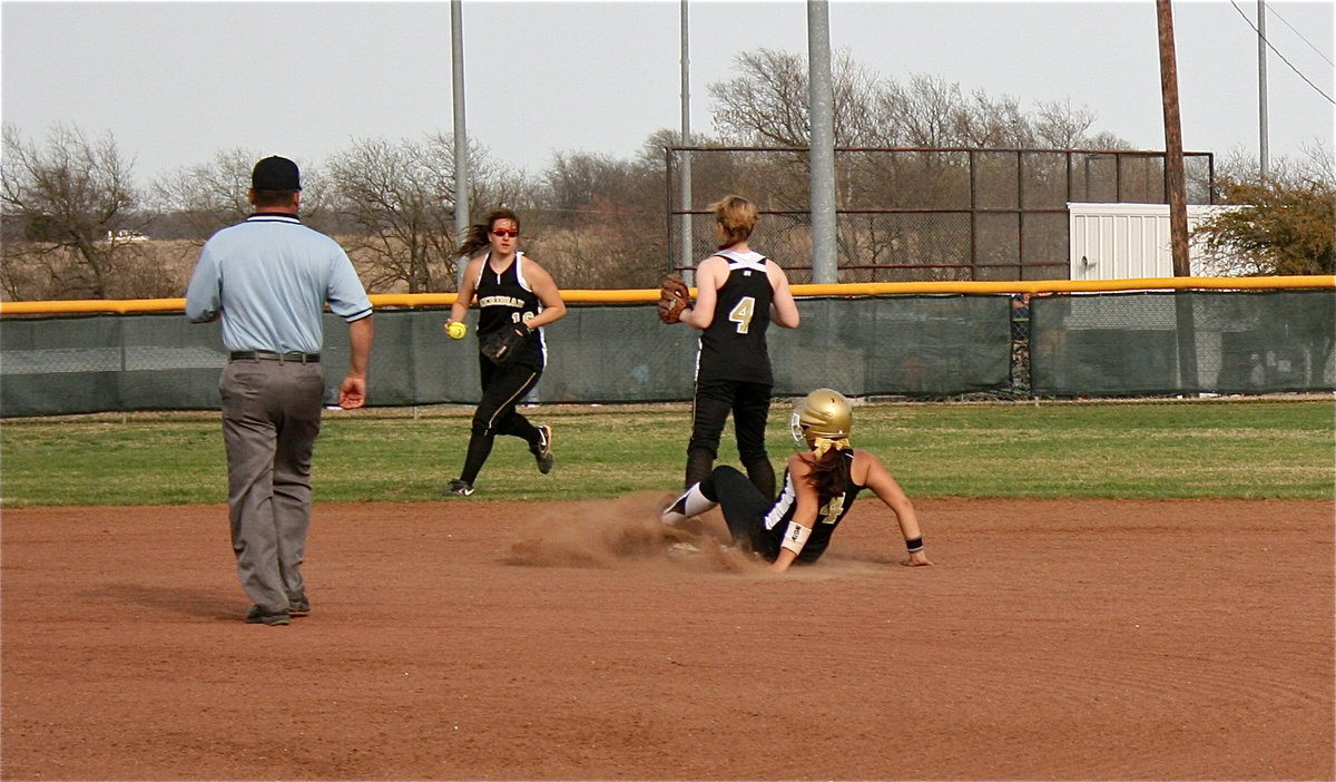 Image: Safe after slide — Alyssa Richards slides feet first into second base for a double.