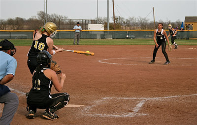 Image: On the mark — Italy’s Paige Westbrook(10) connects with the ball for a base hit.