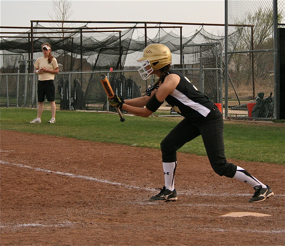 Image: The switch-a-roo — Oh, she’s versatile! Anna Viers(3) threatens to bunt against Meridian.