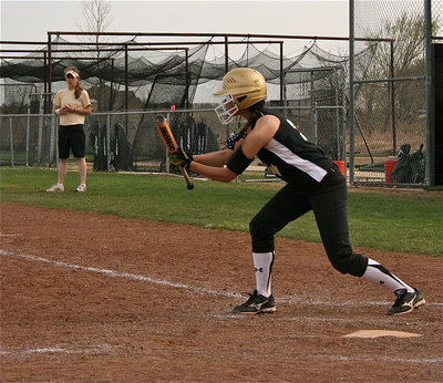 Image: The switch-a-roo — Oh, she’s versatile! Anna Viers(3) threatens to bunt against Meridian.