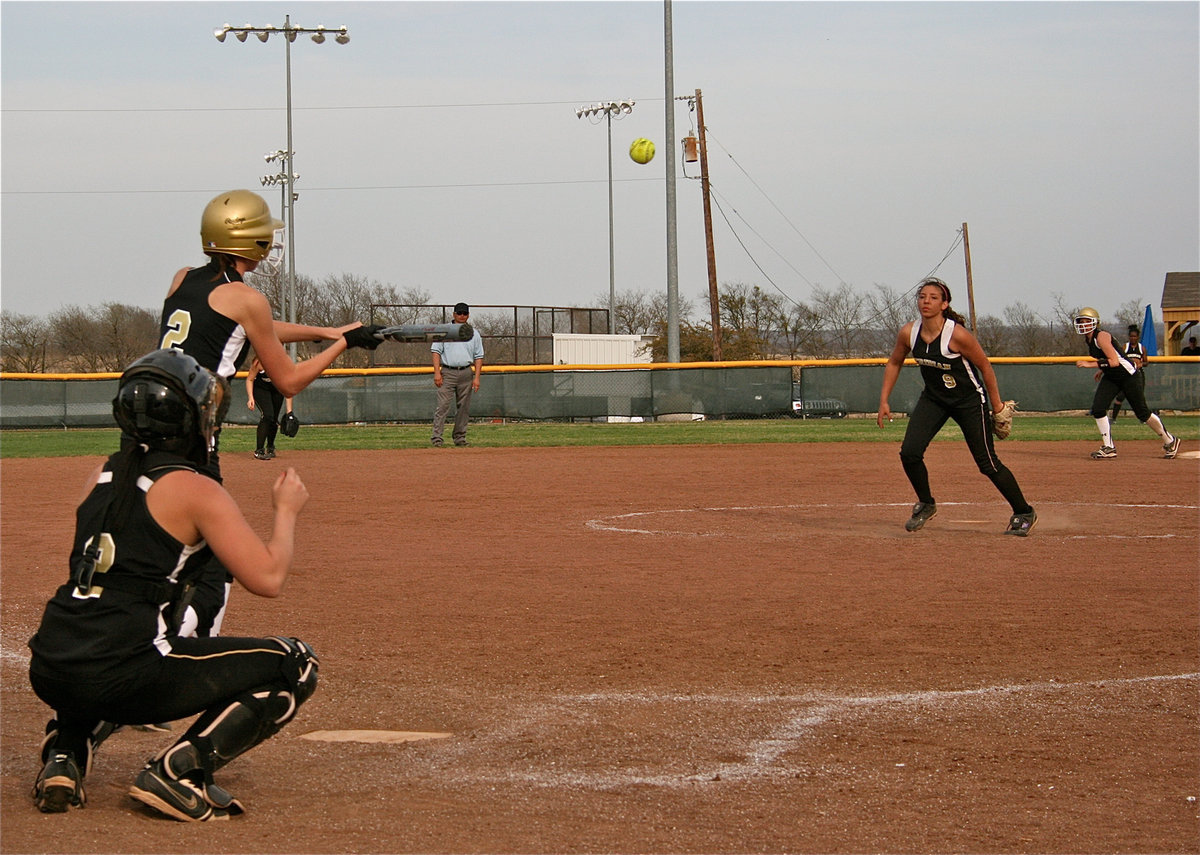 Image: Rossa joins the fun — Kaitlyn Rossa(2) taps one back to the Meridian defense.