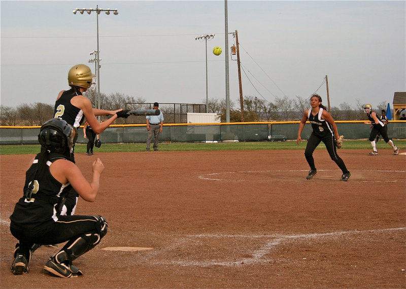 Image: Rossa joins the fun — Kaitlyn Rossa(2) taps one back to the Meridian defense.