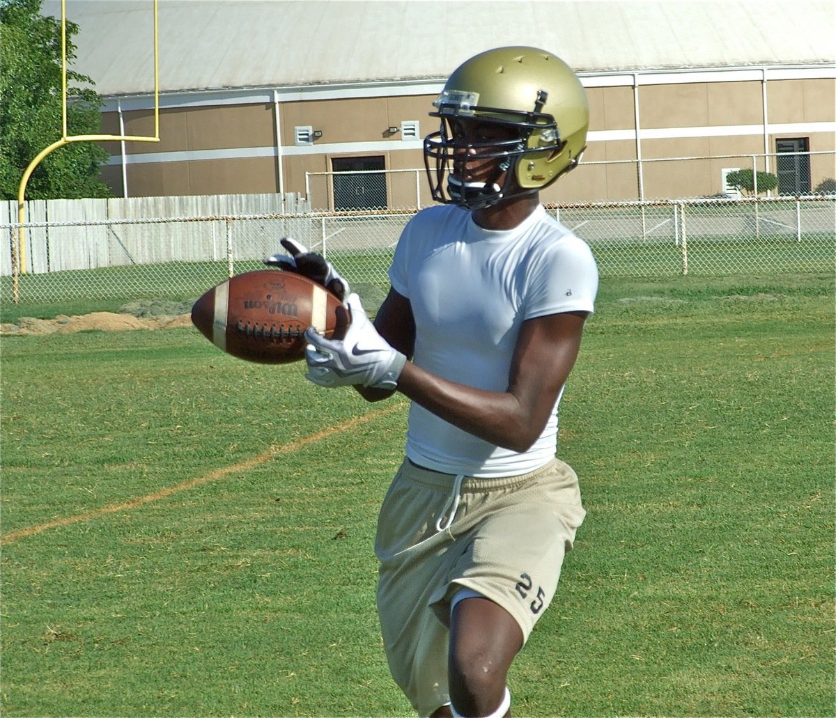 Image: Corrin snags it — Corrin Frazier hauls in a pass during receiver drills.