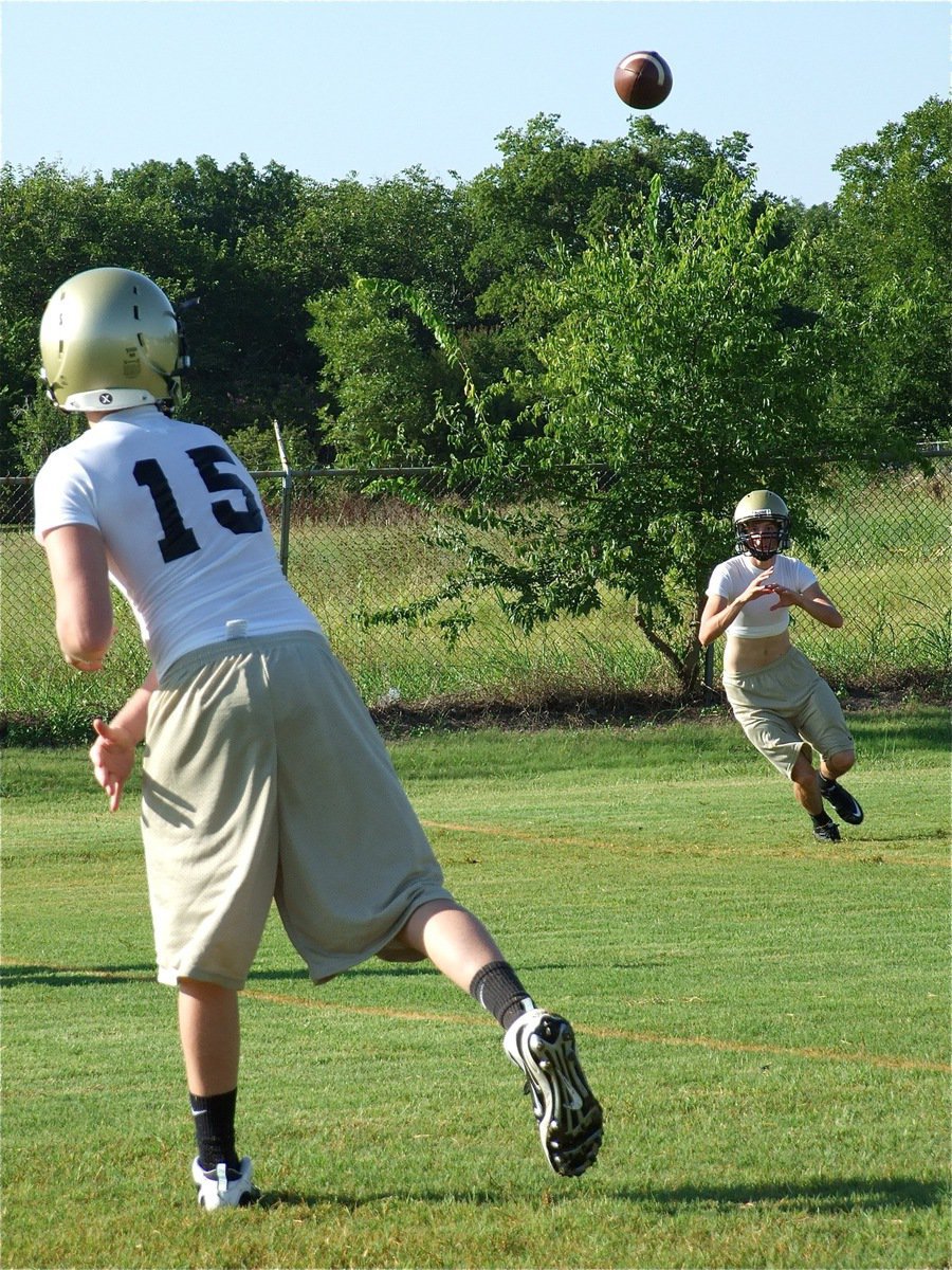 Image: Justin throws a strike — Quarterback Justin Buchanan has looked sharp after trading in his baseball for football.