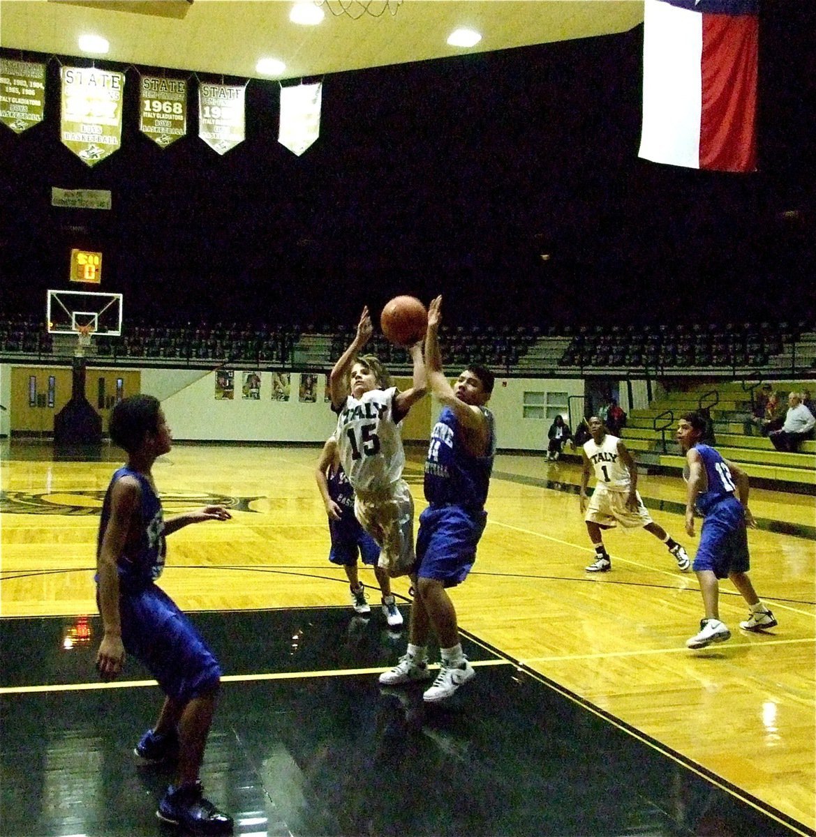 Image: Lefty on the loose — Levi McBride(15) leans into the paint for a shot attempt.