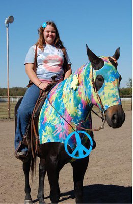 Image: Alyssa Ballew of Midlothian — Alyssa Ballew of Midlothian was the most psychedelic with she and her horse dressed like hippies.