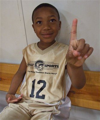Image: Zorian’s proud — Zorian Burley(12) is proud of his team during their big win.