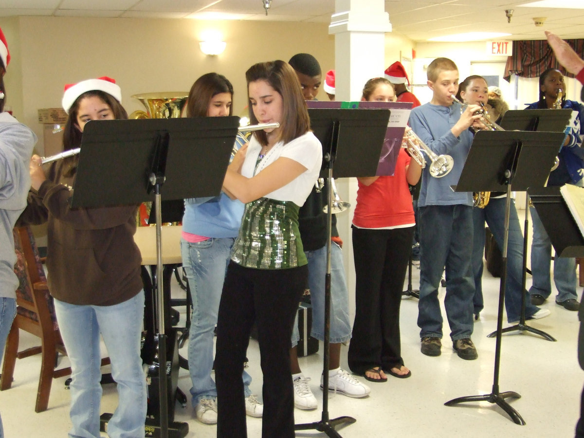 Image: Milford Band  — Milford High School band playing their rendition of “Greensleeves” at Pleasant Manor.