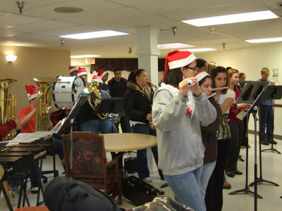 Image: Playing Jingle Bell Rock — Jingle Bell Rock is rocking the audience.