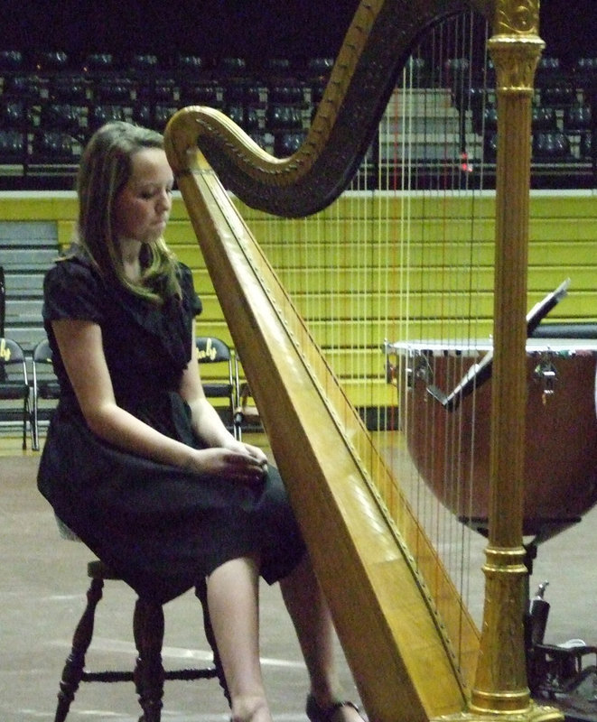 Image: The golden harp — Madeline Pittman played beautiful music at the annual Italy High School Christmas Concert on Thursday.  Both 7th grade and high school blessed the community by playing.