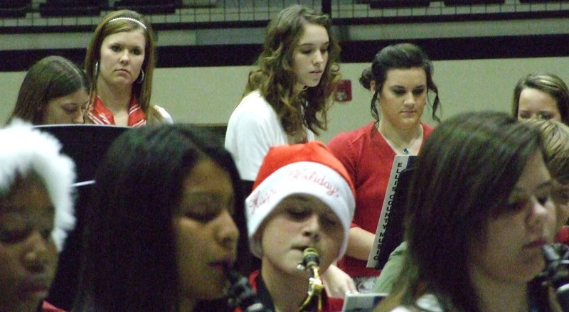 Image: Percussion, baby — Kaitylyn Rossa, Melissa Smithey and Kaytlyn Bales follow the music and Mr. Perez.