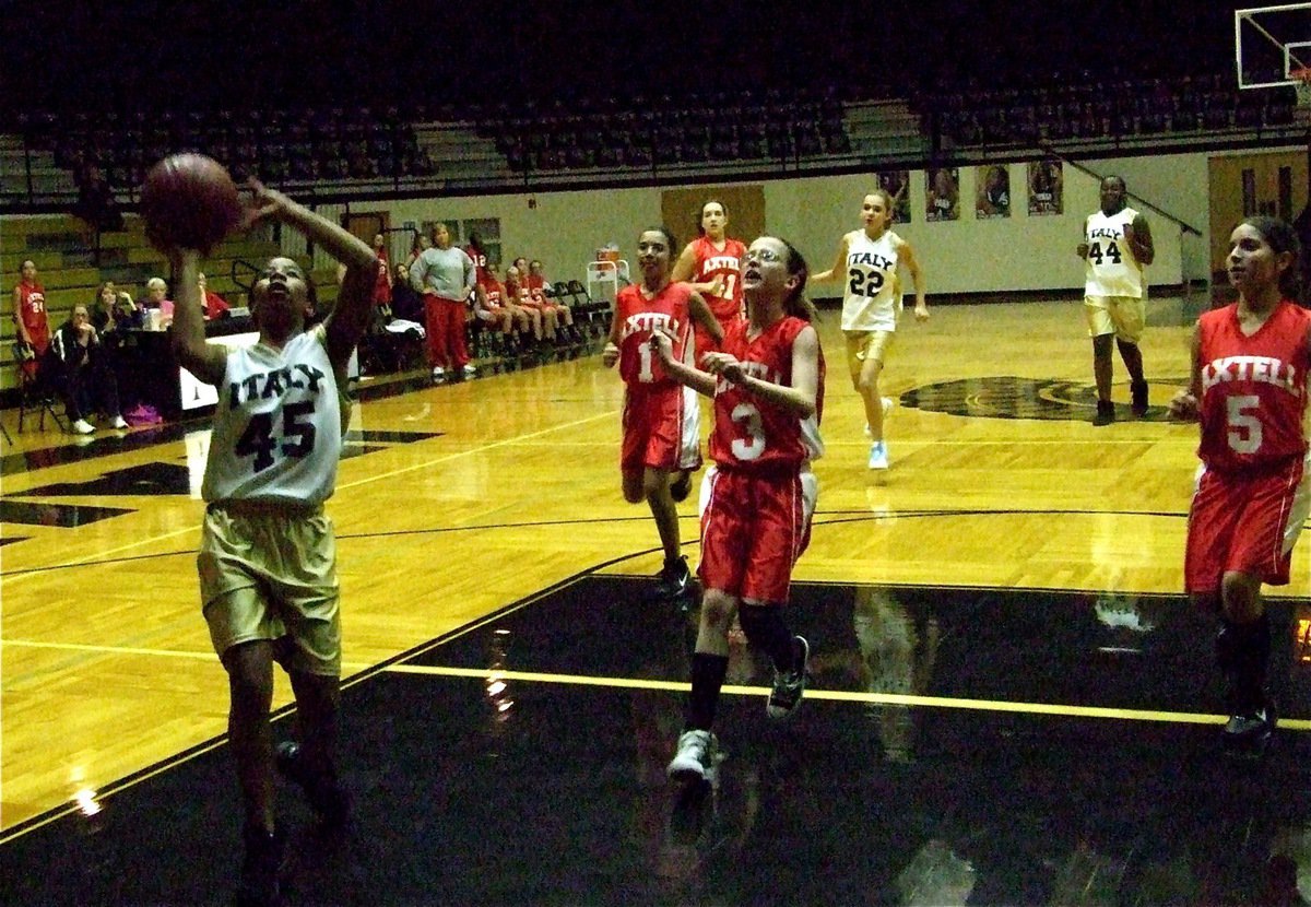 Image: Italy’s Raven Harper(45) steals and scores against Axtell — Trailing 10-0 in the fourth, Italy’s Raven Harper electrifies the coliseum with one final surge to close in on Axtell. Harper scored three consecutive baskets but Axtell held on for a 10-6 win.