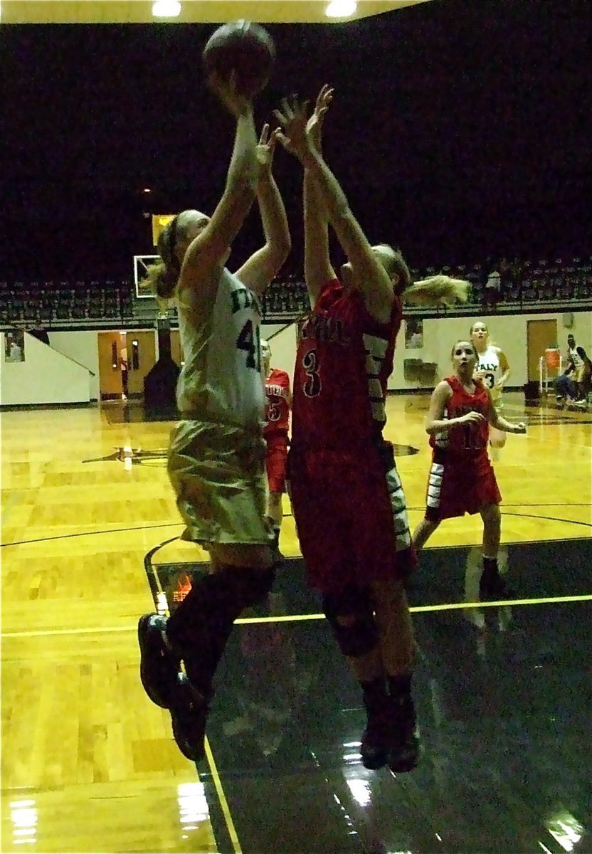 Image: Jaclynn has skills — Jaclynn Lewis(41) scores over an Axtell defender with very little separating the talent level on these two teams.